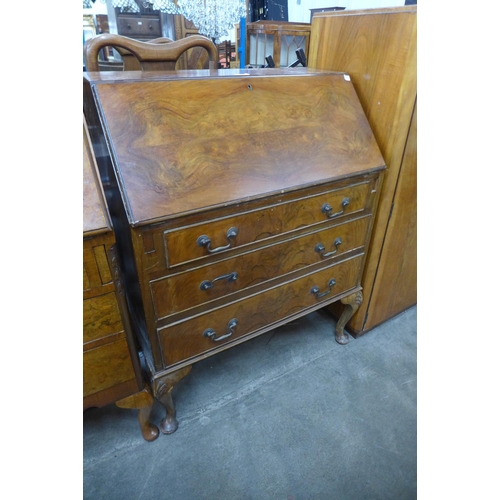 229 - A walnut bureau de dame