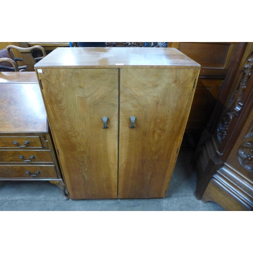 230 - An Art Deco walnut tallboy