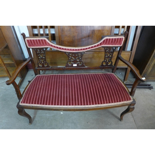 232 - An Edward VII mahogany salon settee