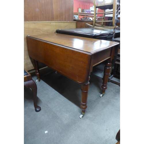 236 - A Victorian mahogany Pembroke table