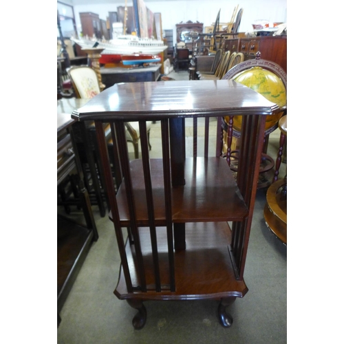 251 - A mahogany revolving bookcase