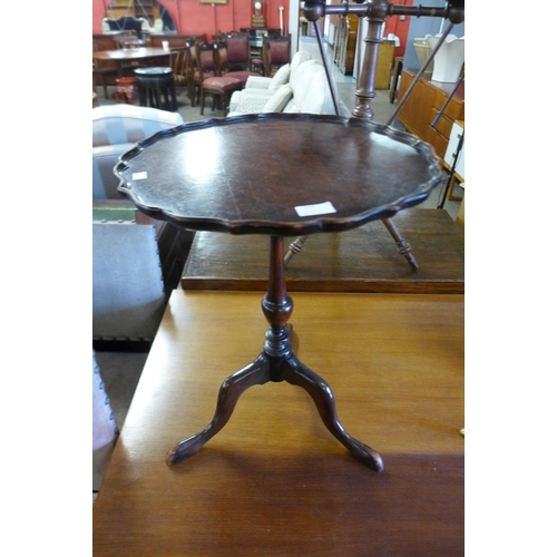 255 - A George III style mahogany wine table