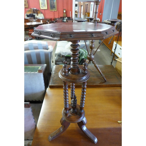 256 - A Victorian walnut jardiniere stand