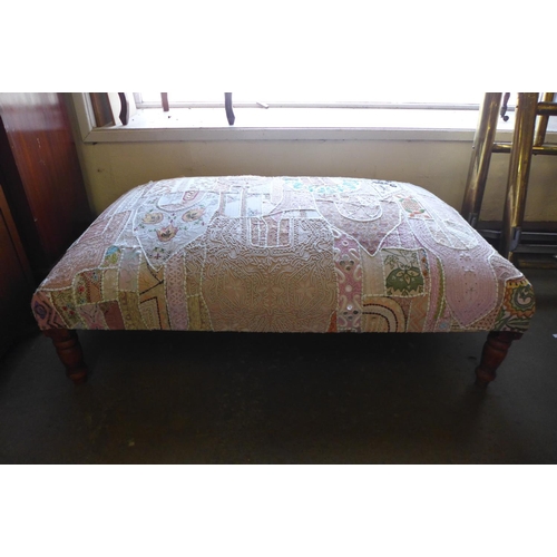 267 - An Indian hardwood and  embroidered  footstool