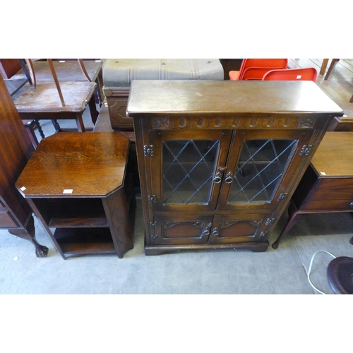 270 - An oak bookcase and an Art Deco oak book table