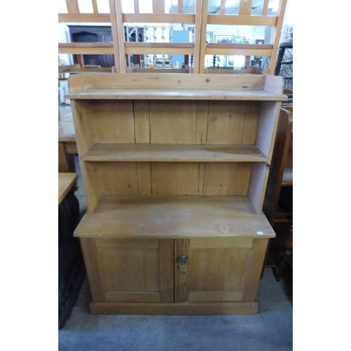 274 - A small Victorian pine open bookcase