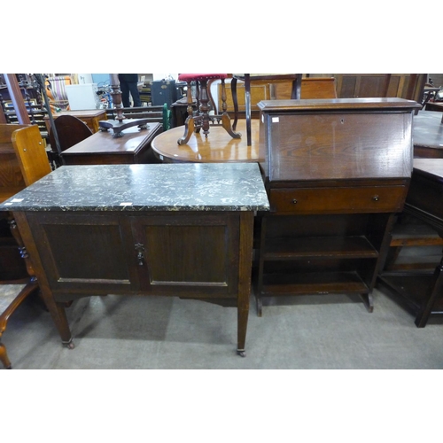 277 - An Edward VII mahogany and marble topped washstand and an oak student's bureau