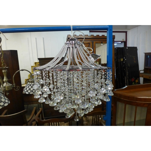 291 - A crystal and chrome chandelier