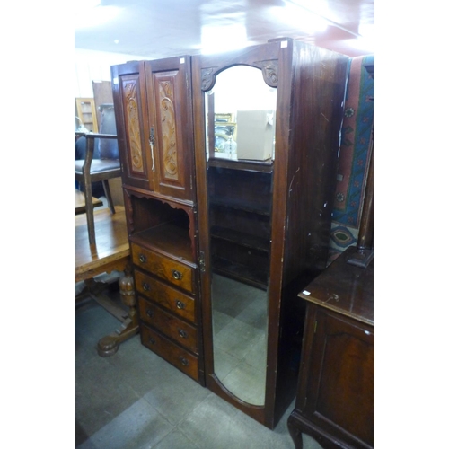 296 - A mahogany and upholstered open armchair