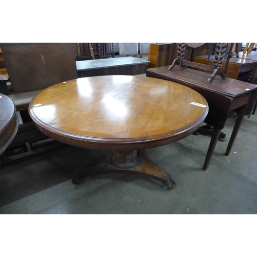 299 - A Victorian rosewood breakfast table and a mahogany breakfast table