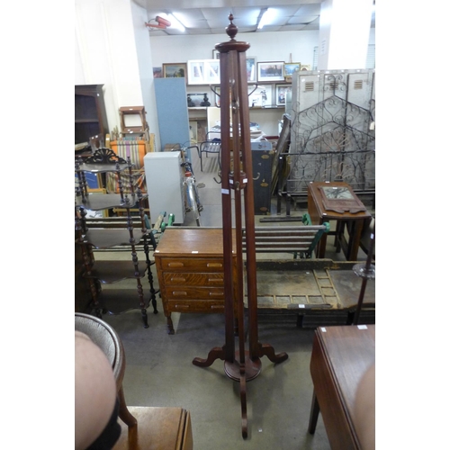 307 - A mahogany coat stand