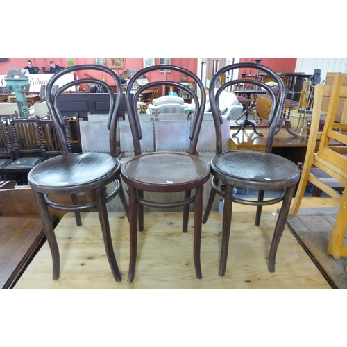 309 - Three bentwood chairs