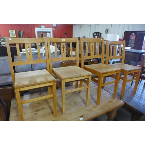 310 - A set of four beech chapel chairs