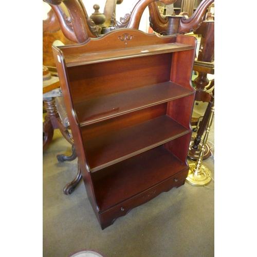 319 - A mahogany open bookcase