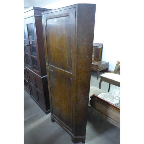 332 - An oak corner hall robe