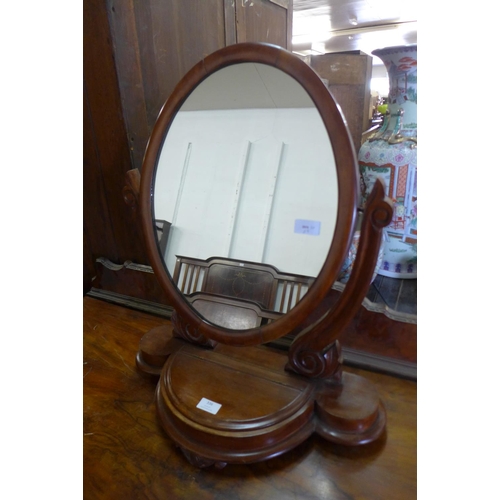 336 - A Victorian mahogany toilet mirror