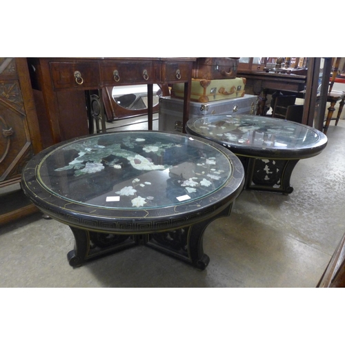 344 - A pair of Chinese black lacquered chinoiserie circular occasional tables