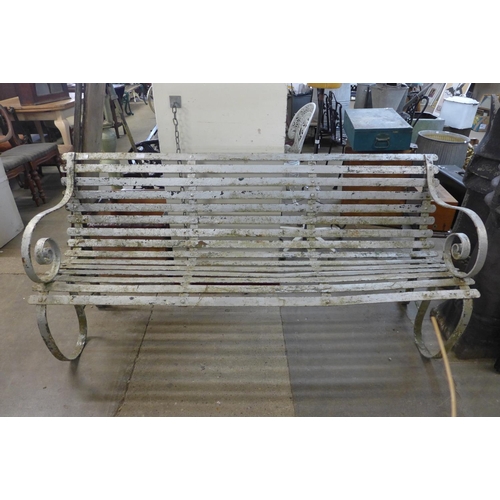 385 - A Victorian wrought iron garden bench