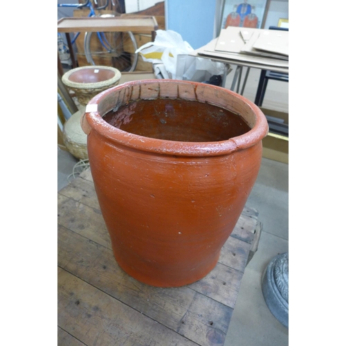 402 - A terracotta planter, a/f