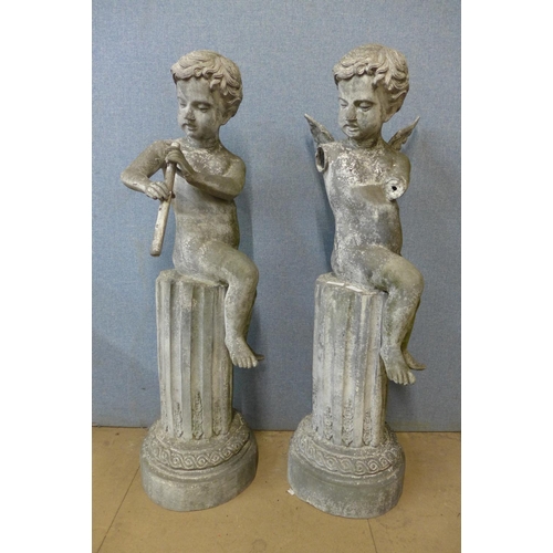 411 - A 20th Century pair of metal cherubs, a/f