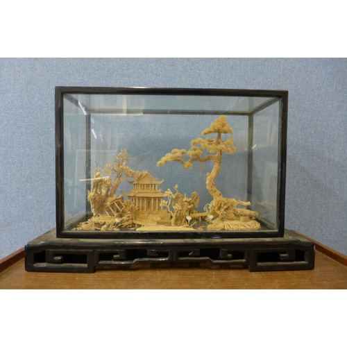 422 - A carved Chinese cork diorama and two others