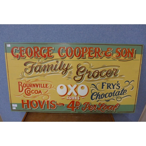 452 - A painted George Cooper & Son Family Butcher sign