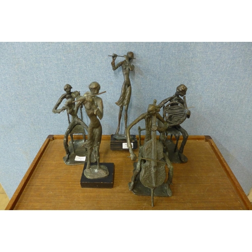 460 - Five cast metal stylised figures of musicians