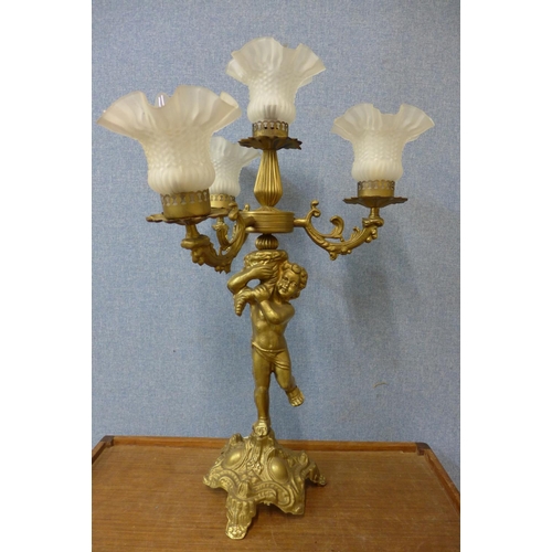 472 - A gilt metal cherub table lamp