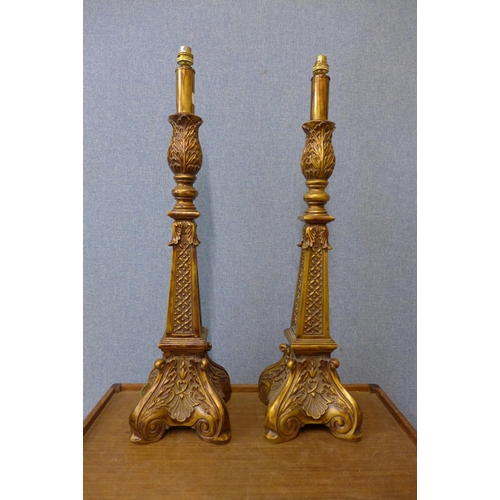 475 - A pair of rococo revival gilt table lamps