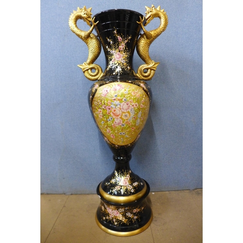 74 - A large Chinese style black porcelain and gilt floor standing vase