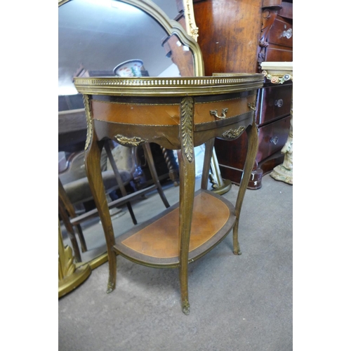 75 - A French style mahogany, gilt metal and marble topped console table