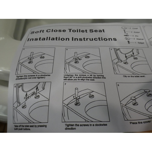 3151 - An Aqua Close coupled toilet with system (toilet cracked) * This lot is subject to VAT