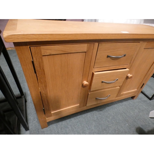 3158 - An oak two door, three drawer sideboard * This lot is subject to VAT