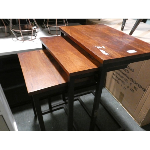 3182 - A darkwood/metal nest of three tables * This lot is subject to VAT