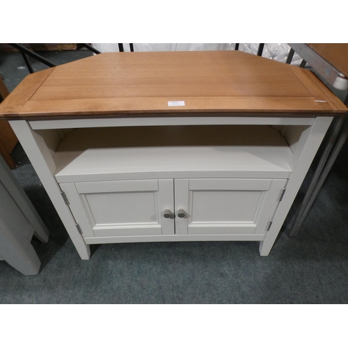 3155 - A cream painted two door corner TV unit * This lot is subject to VAT