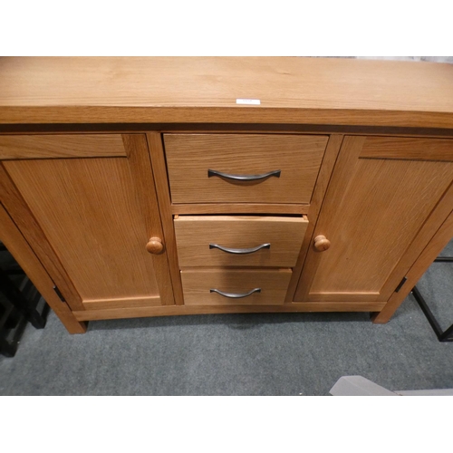 3158 - An oak two door, three drawer sideboard * This lot is subject to VAT
