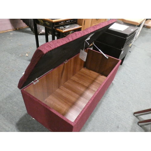 3161 - A purple upholstered, studded lift-up footstool * This lot is subject to VAT