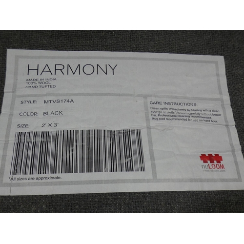 3271 - A black and white patterned rug (60cm x 90cm) * This lot is subject to VAT