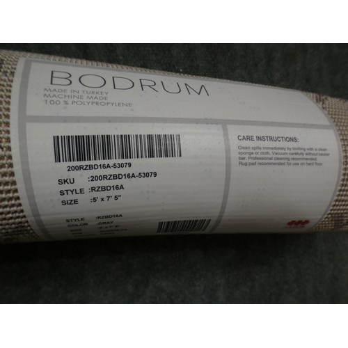 3285 - A white and silver patterned rug (150cm x 230cm) * This lot is subject to VAT