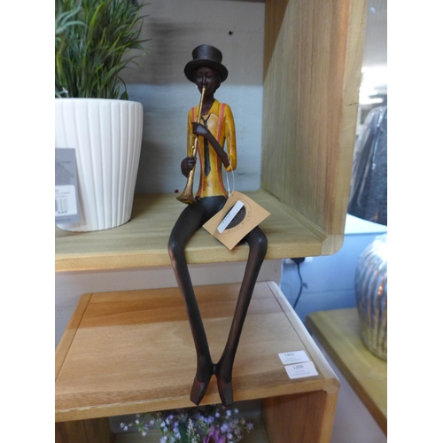 1395 - A sitting jazz band trumpeter, 39cms (026109)   #