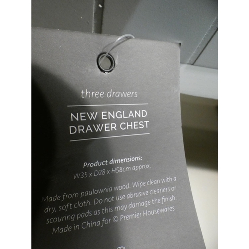 3185 - A white/multi-coloured drawer painted three drawer chest * This lot is subject to VAT