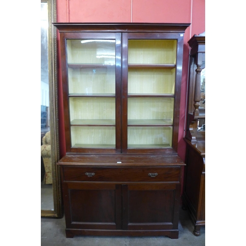 67 - A Victorian mahogany bookcase (lacking one glass pane to door)