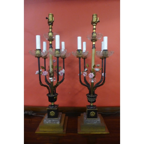 73 - A pair of Italian style gilt metal, marble and floral encrusted table lamps