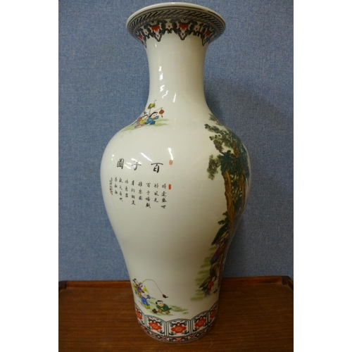 46 - A Chinese famille verte porcelain vase, 66cms h