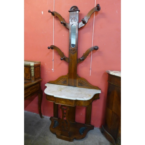 54 - A Victorian walnut and marble topped tree shaped hallstand