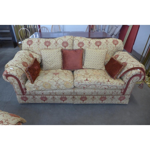 1317 - A red and gold fabric upholstered two piece suite