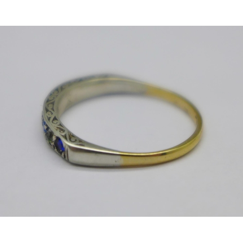 1002 - A 9ct gold and silver, blue and white stone ring, O