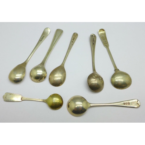 1024 - Seven silver condiment spoons including two 19th Century, (one marked 830), 37g