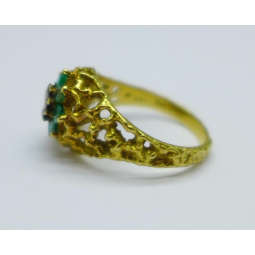 1027 - An 18ct gold, emerald and diamond ring, 4.5g, O