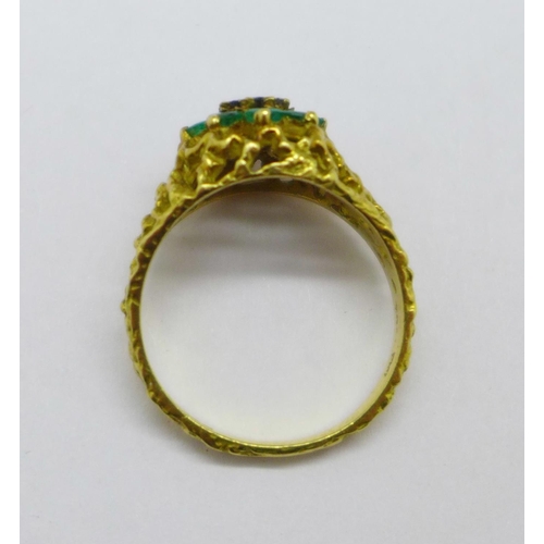 1027 - An 18ct gold, emerald and diamond ring, 4.5g, O